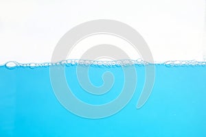 Water Surface Splash and wave bubbles blue water