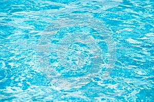 Water in swimming pool, background with high resolution. Wave abstract or rippled water texture.