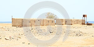 Water tank behind poor houses in Marsa Alam