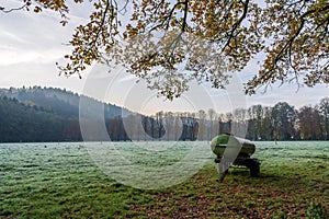 Water tank on the field in autumn.