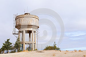 A water tank in a rural landscape