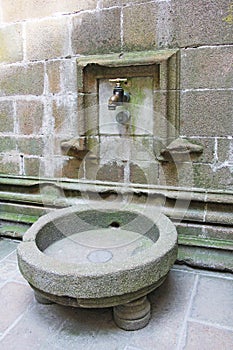 Water tap in abbey Mont Saint Michel