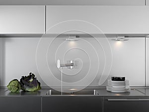 Water tap and dishes in a modern kitchen