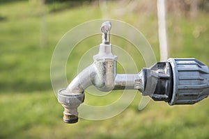 Water tap with hose adapter