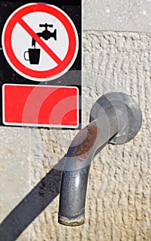 Water tap with a Non-potable sign