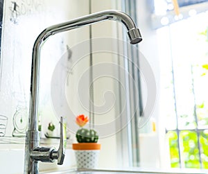 Water tap with sink