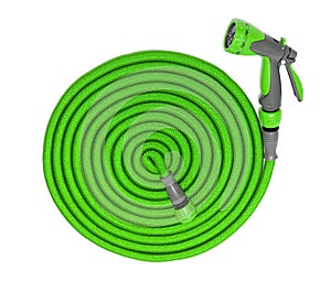 Water taps and a green garden hose with a sprayer