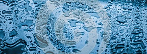 Water texture abstract background, aqua drops on blue glass as science macro element, rainy weather and nature surface art
