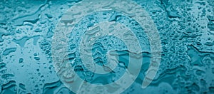 Water texture abstract background, aqua drops on turquoise glass as science macro element, rainy weather and nature surface art