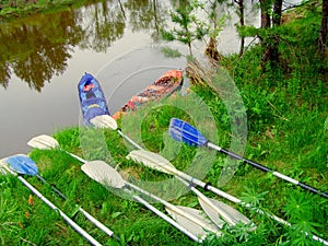 Water tourism on kayaks. Summer vacation on boats to sail along the river.