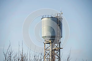 Water tower against the sky