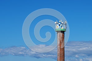 Water tower. Beautiful interior decoration and many antennas mounted on top