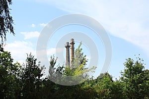 Water tower on blue sky background