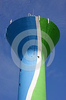 Water tower with cellular phone network antennas photo