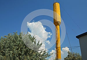 A water tower is an elevated structure supporting a water tank constructed at a height sufficient to pressurize a water supply