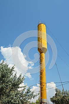 A water tower is an elevated structure supporting a water tank constructed at a height sufficient to pressurize a water supply