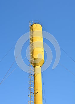 A water tower is an elevated structure supporting a water tank constructed at a height sufficient to pressurize a water supply