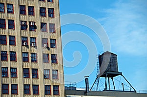 Water tower and high-rise building