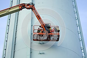 Water Tower with Maintenance Workers