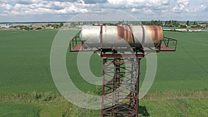 The water tower. An old rustic communal communication. The water tower