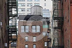 Water towers on the roofs of a buildings