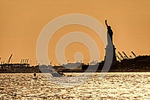 Water traffic on the Hudson River around Statue of Liberty, New York