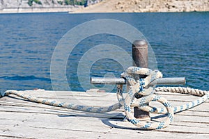 Water trips in Turkey. Mooring bollard with rope