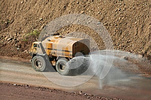 Water truck working at a rock quarry