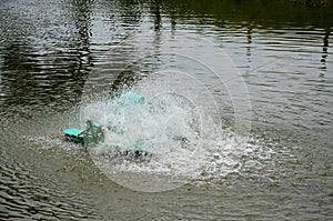 Water turbine Machine in pond at countryside