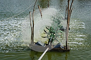 Water Turbines Supplying Fish Pond