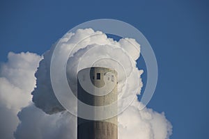 water vapor coming out of the chimney of the Hemcentrale, a coal power plant in Amsterdam of Vattenfall photo