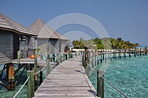 Water Villa with Wooden Pier in Sunny Maldives