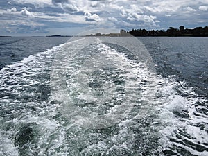 Water wake surface waves behind a boat