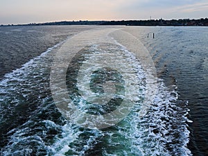 Water wake surface waves behind a boat