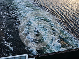 Water wake surface waves behind a boat