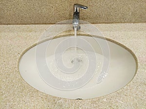 Water wastage from tap in washbasin in bathroom