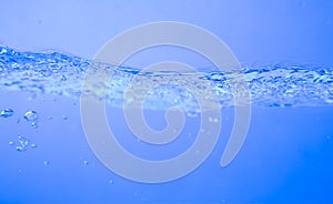 Water wave blue splash background isolated,motion liquid shape stream curve,  bubbles to clean drinking water purity and freshness