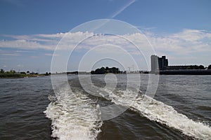 Water waves of the jet streams on the river Lek made by the Waterbus at high speed