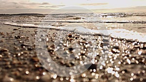 Water waves on sand beach, tourist destination, water care concept