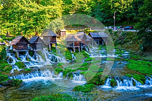 a water way that has a bunch of small wooden houses