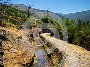 Water way in Serra da Estrela, Portugal photo