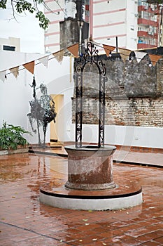 Water well at the archaeological museum in Corrientes, Argentina photo