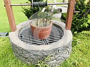 Water Well With Pulley and Bucket.