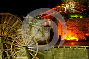 Water wheel ,landmark of Lijiang Dayan old town at night.