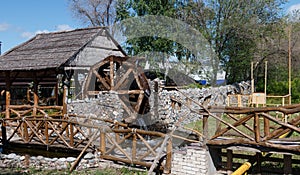 water wheel and running water on a stone structure