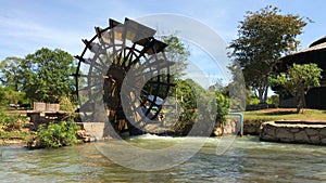 Water-wheels turbine rotating in the garden