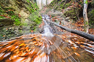 Water whirl in creek in Turovska roklina gorge during autumn in Kremnicke vrchy mountains