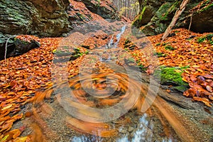 Water whirl in Tajovska dolina gorge near Tajov village during autumn