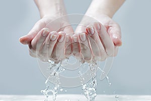 Water in woman hand