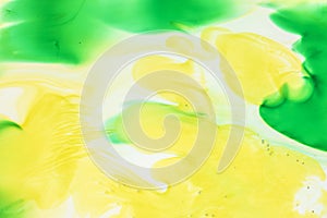 Watercolor and acrylic abstract. Colorful background. Mix, splashes and drawings of colors: green, yellow, brown, white background